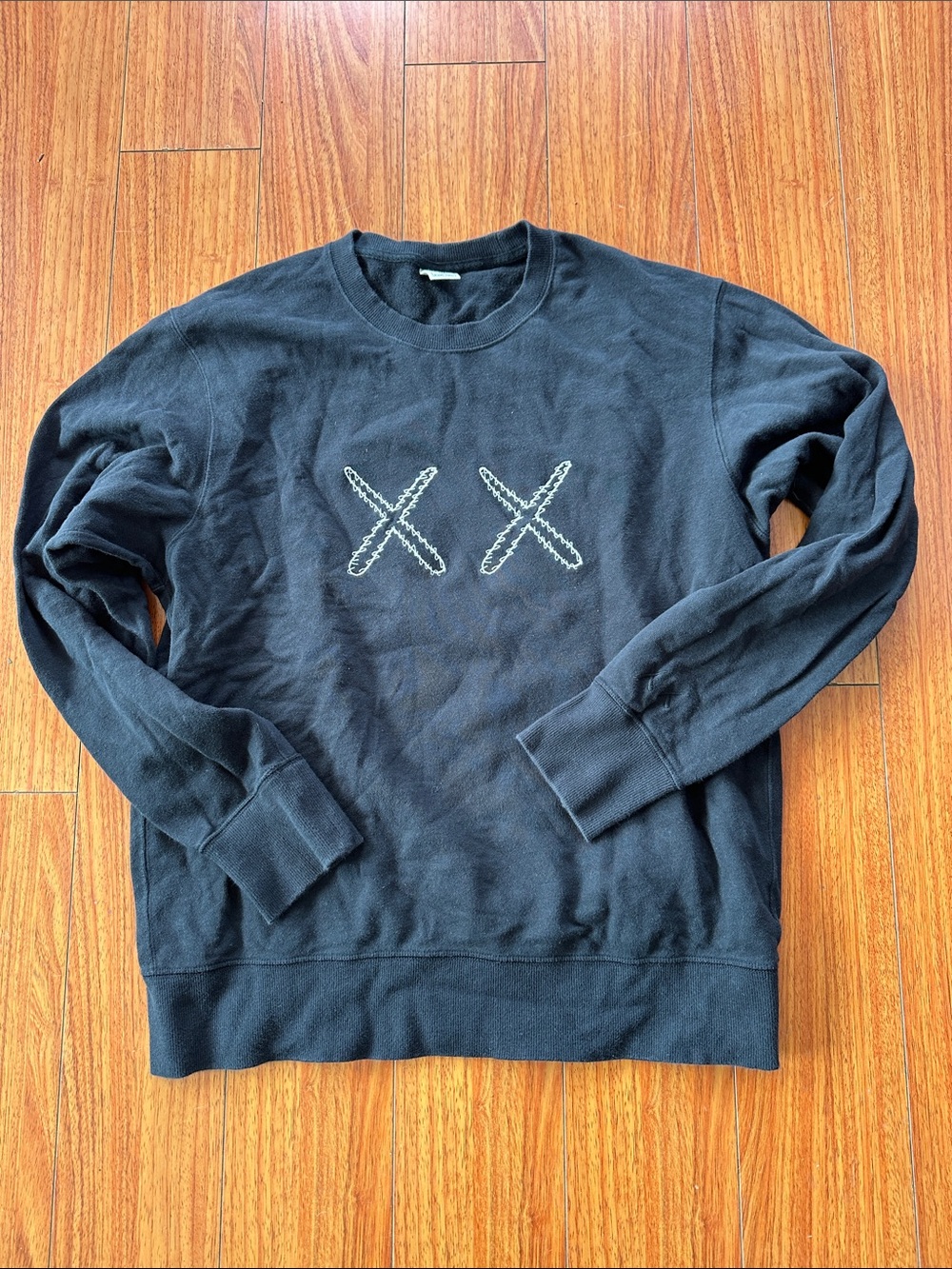 Uniqlo x KAWS Men’s Black Crewneck Sweatshirt with White XX Stitch